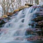 Tall-Rocky-Waterfall-and-Pond